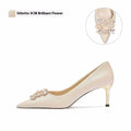 Pointed toe crystal bridal high heels with rhinestones on a cloth upper, showing stiletto and cat heel style options.