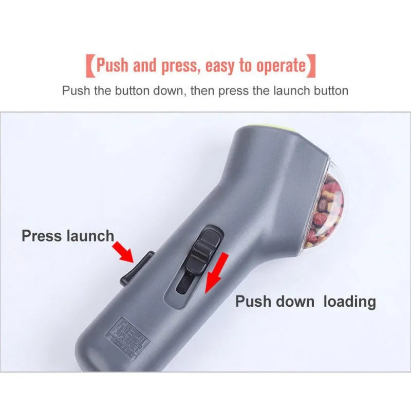 Grey pet snack catapult launcher showing spring trigger mechanism and compact 18cm design