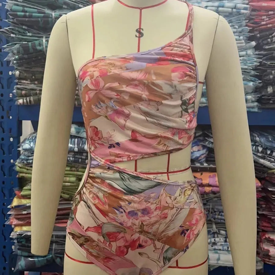 Women's rose gold patterned swimsuit made from polyester fibre, available in sizes S to XXXL