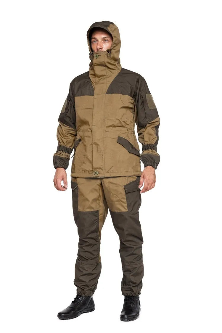 Men's special forces tactical jacket and trousers set in olive green, shown in an outdoor setting.