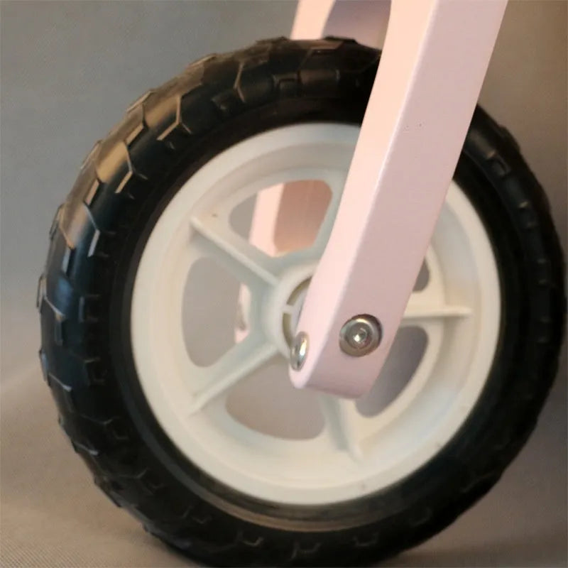 Pink wooden children's balance scooter with 10-inch wheel for ages 1-6