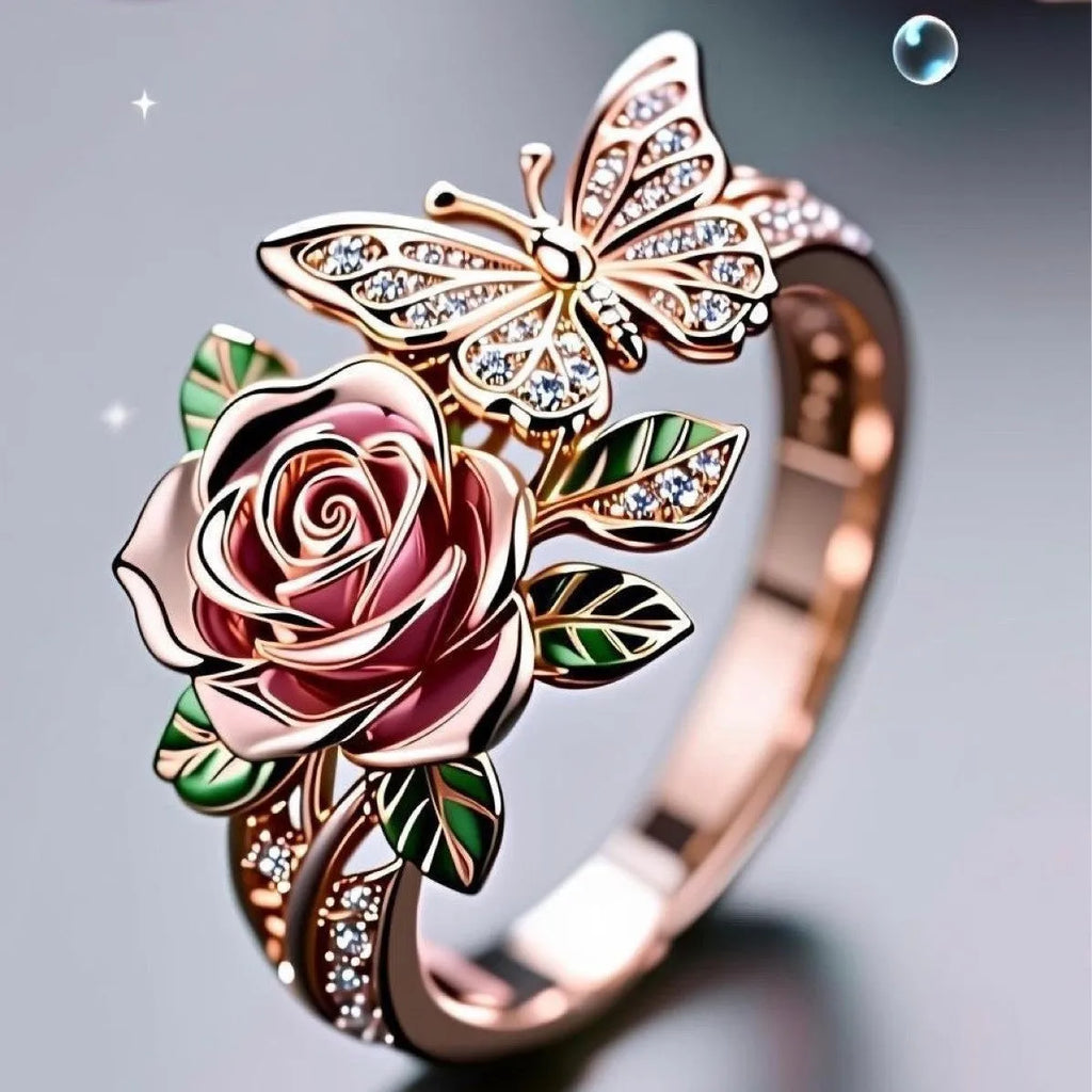 Adjustable butterfly ring with colourful oil drip finish showing floral and insect modelling in alloy metal