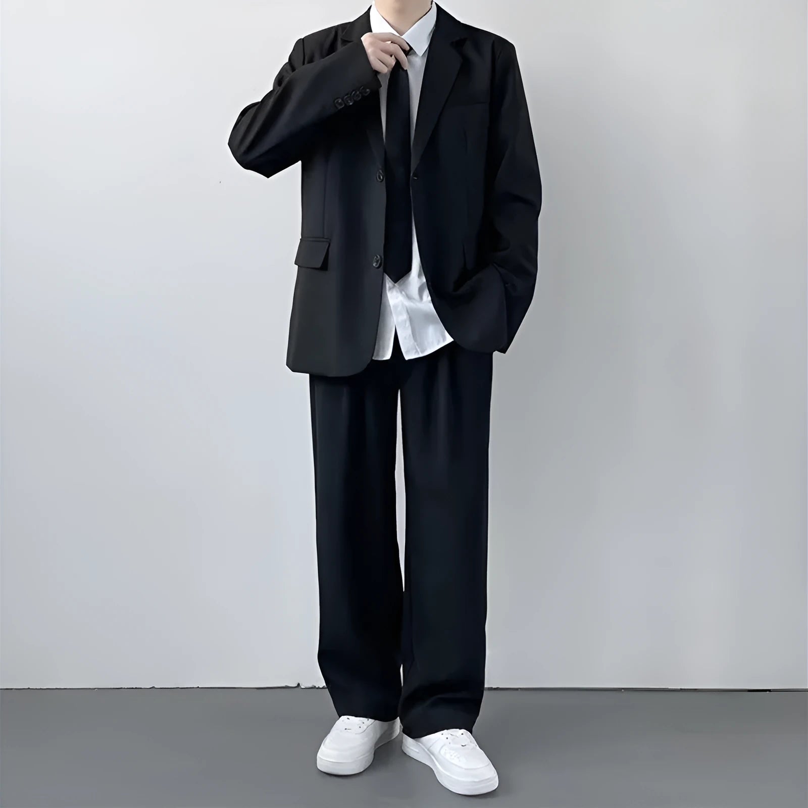 Plus size men's college style suit set with loose fit jacket, trousers, white shirt and tie for spring and autumn wear