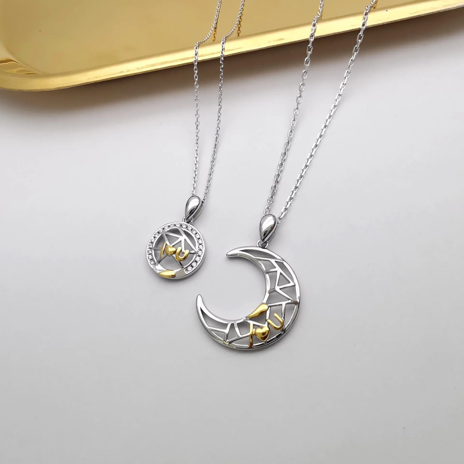 Sun and moon couple necklace set with electroplated copper pendants and cross chain