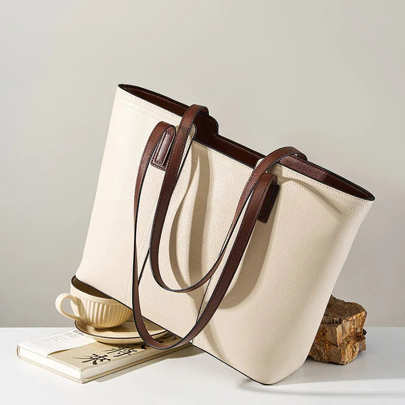 Genuine leather women's crossbody commuter bag in black with internal organisation compartments