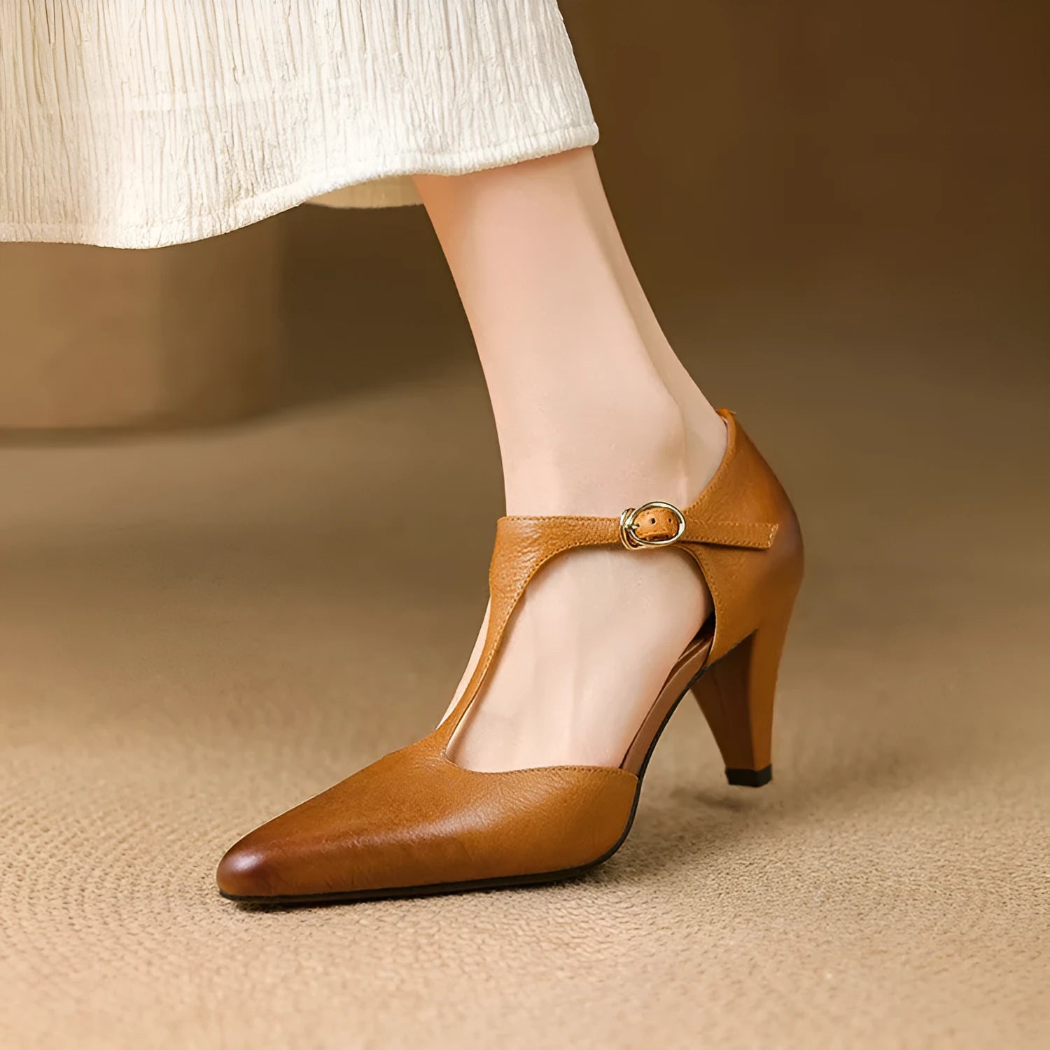 Women's brown retro T-bar strap sandals with a closed round toe and a chunky leather heel.