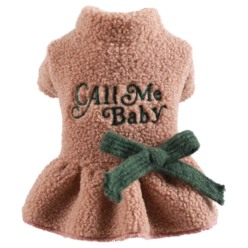 Pet clothing warm Berber fleece skirt in dark blue with letter print on a standing dog.
