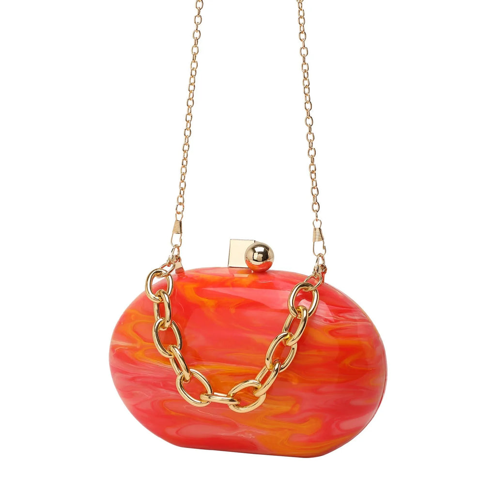 Oval acrylic chain crossbody handbag in pearlescent white with chain strap and hard shell structure