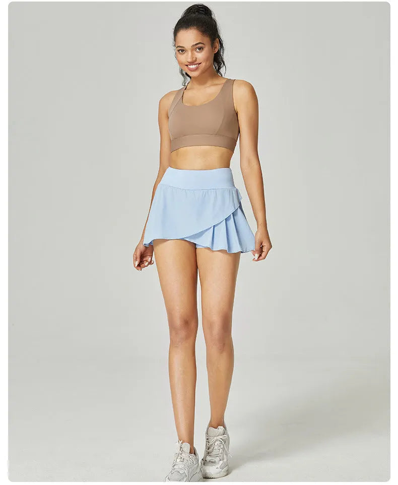 Women's solid colour quick-dry sports shorts in Klein blue on a white background.