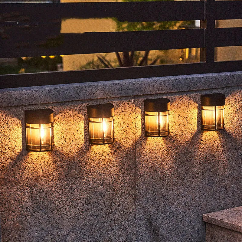 Set of solar outdoor wall lights with warm light, IP65 waterproof, for patio balcony or garden use