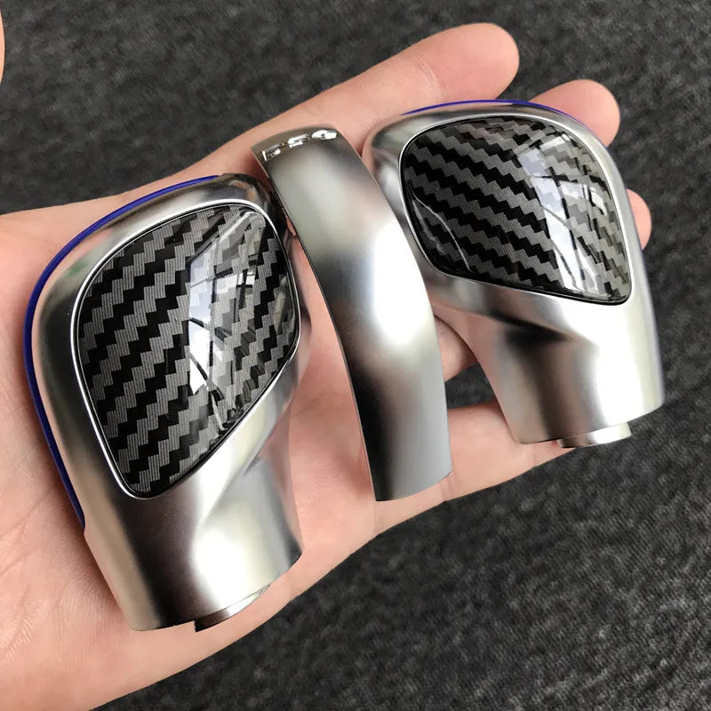 Carbon fibre DSG gear side cover with chrome matt finish and leather knob on shifter assembly