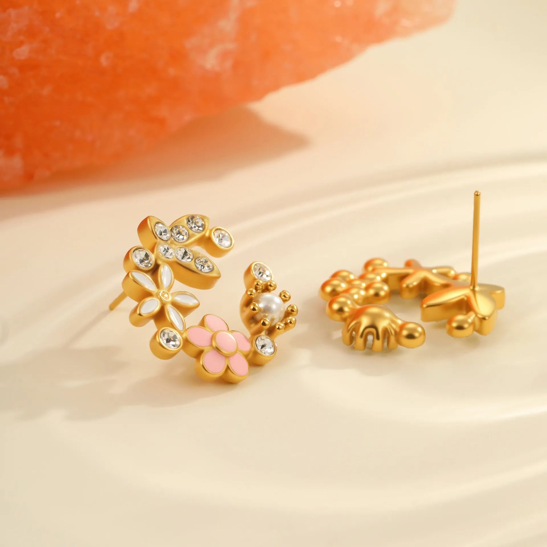 Gold plated flower stud earrings with colourful petal design on stainless steel