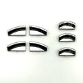 Black glitter decorative sticker for a car window lift button on a door panel