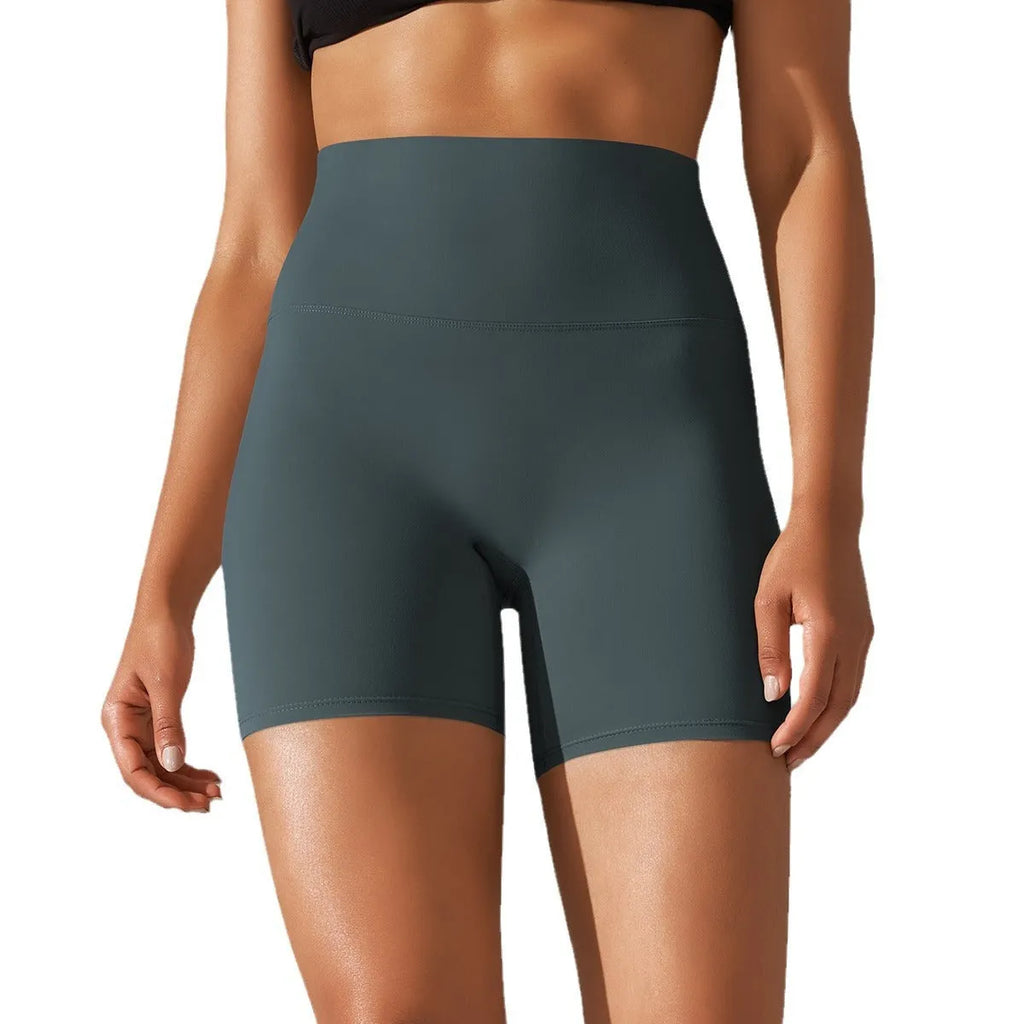 High waist hip lift fitness pants for women in black with belly control and moisture wicking