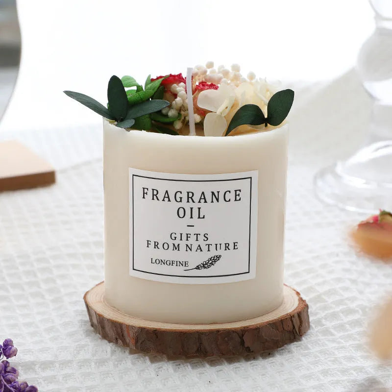 Aromatherapy candle with dried flowers on top, shown in various scent style options.