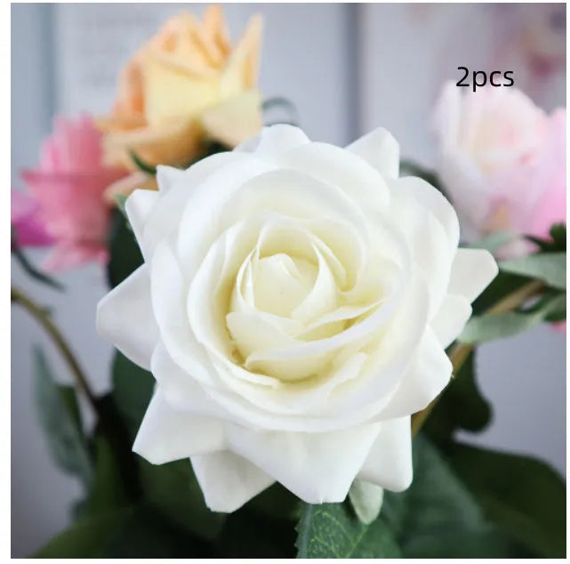 Artificial silk flower bouquet measuring approximately 42cm long with 8.5cm flower heads in multiple colour options