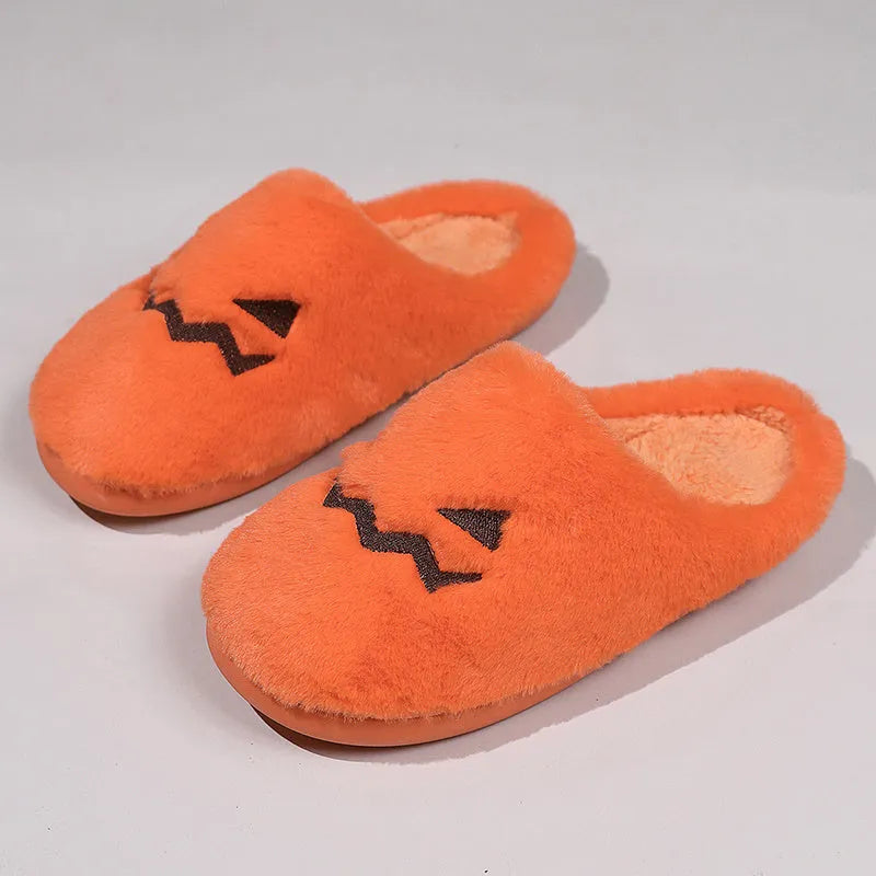 Orange plush-lined indoor slippers with non-slip PVC soles and coral velvet upper