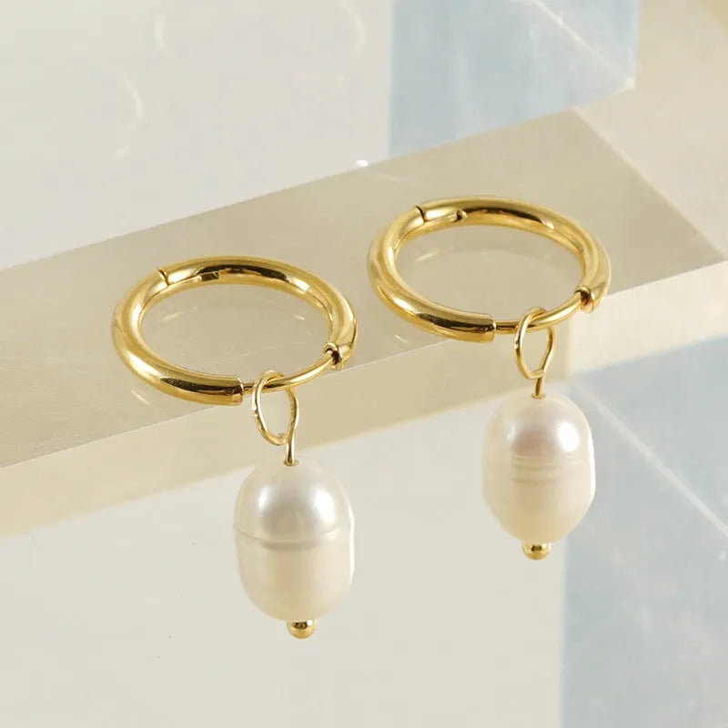 Geometric gold stainless steel earrings with pearl accents and titanium posts
