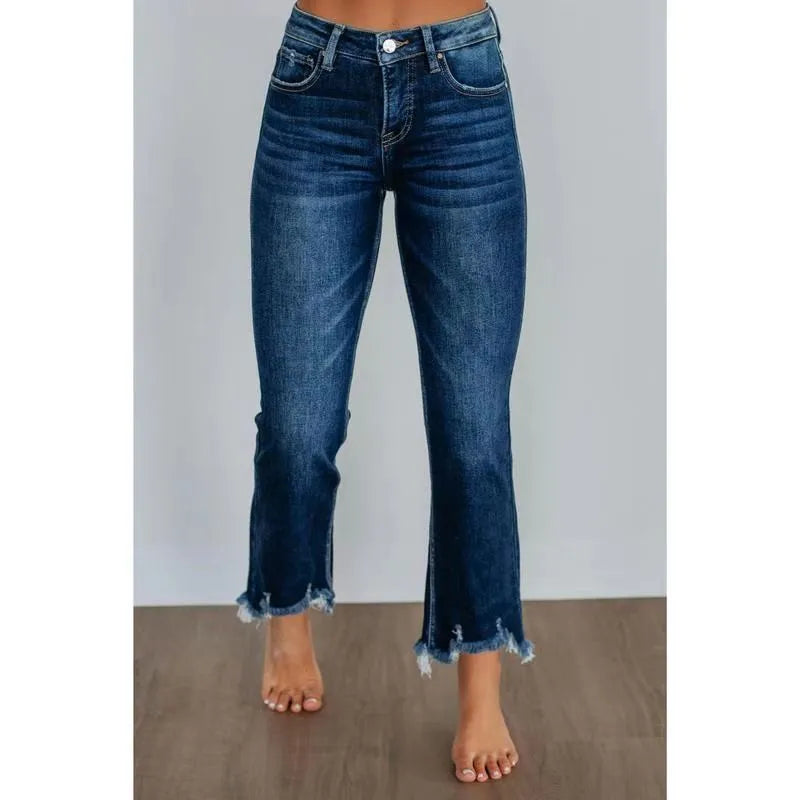 Women's solid colour cotton denim jeans with manual distressing in dark blue and light blue options