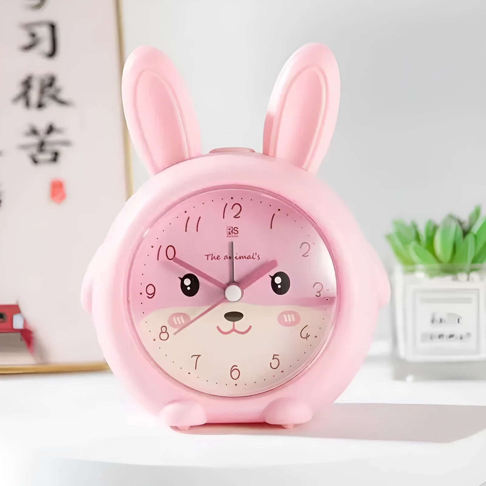 Children's cartoon alarm clock in pink or blue with mute, night light and snooze functions