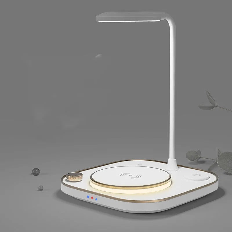 Alpharan three-in-one wireless magnetic charger desk lamp with 15W fast charging in black finish on a desk