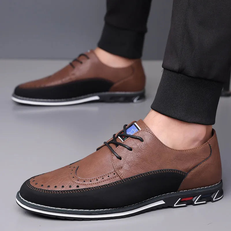 Men's black leather casual shoes with a low top, rubber sole, and sewing line detail on a fabric upper.