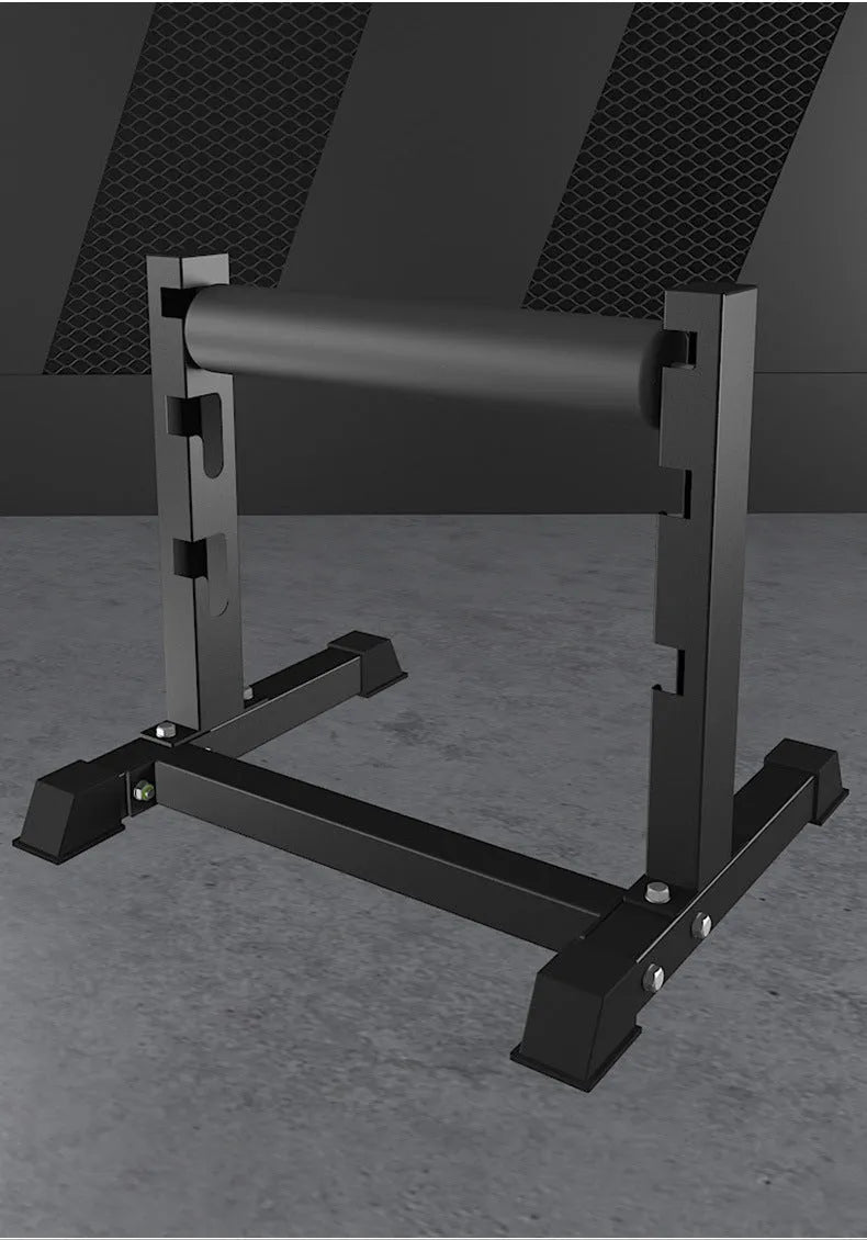 Black steel leg press trainer for split squats and balance exercises in a home gym setting