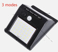 Solar outdoor garden lamp with motion sensor and LED bulbs for automatic night lighting