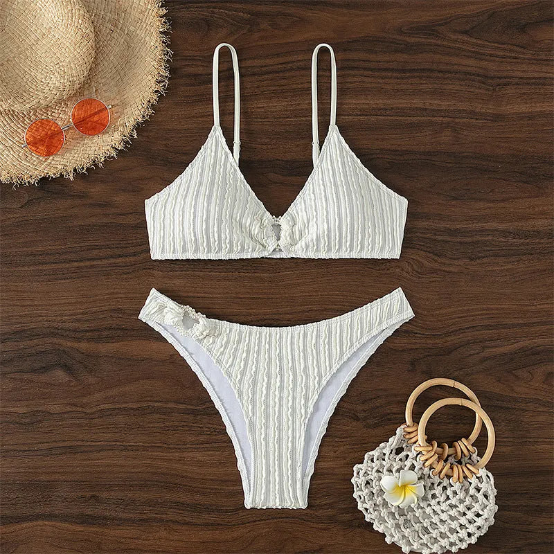 White women's V-neck beach split swimsuit with sleeveless top and matching shorts