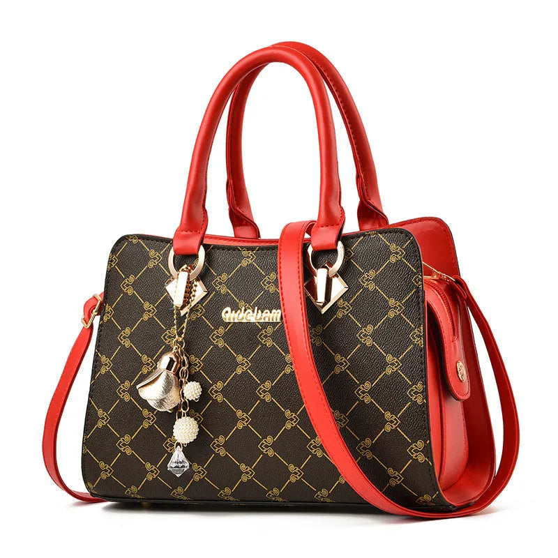Women's geometric print messenger bag in PU material with internal card slots and phone compartment