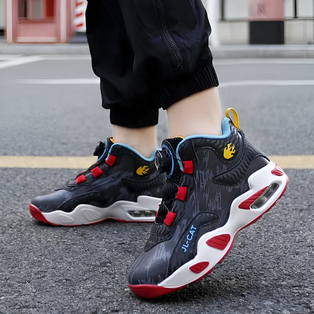 Children's rotating button basketball shoes in synthetic leather, shown in black colourway.