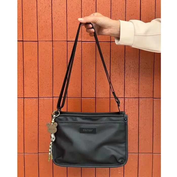 Niche High Sense unisex casual trendy cool retro Oxford cloth small square crossbody bag, single bag without ornaments.