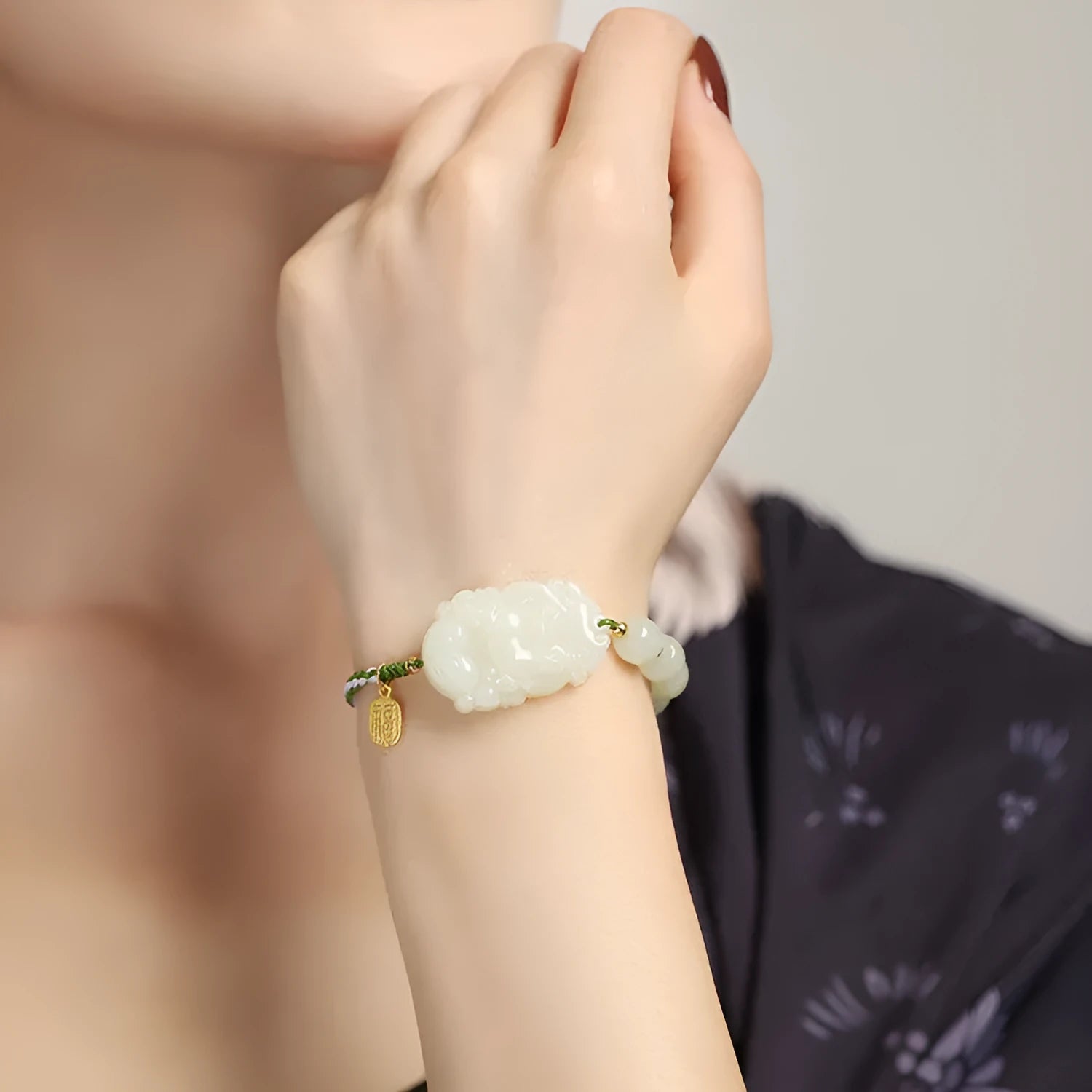 Year of Rabbit Hetian jade bunny bracelet with S925 silver blessing card on red ice cotton rope