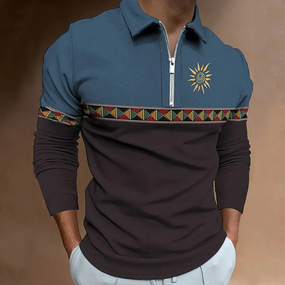 Man wearing a loose-fit long sleeve t-shirt with retro colour block printing and a decorative zipper detail.