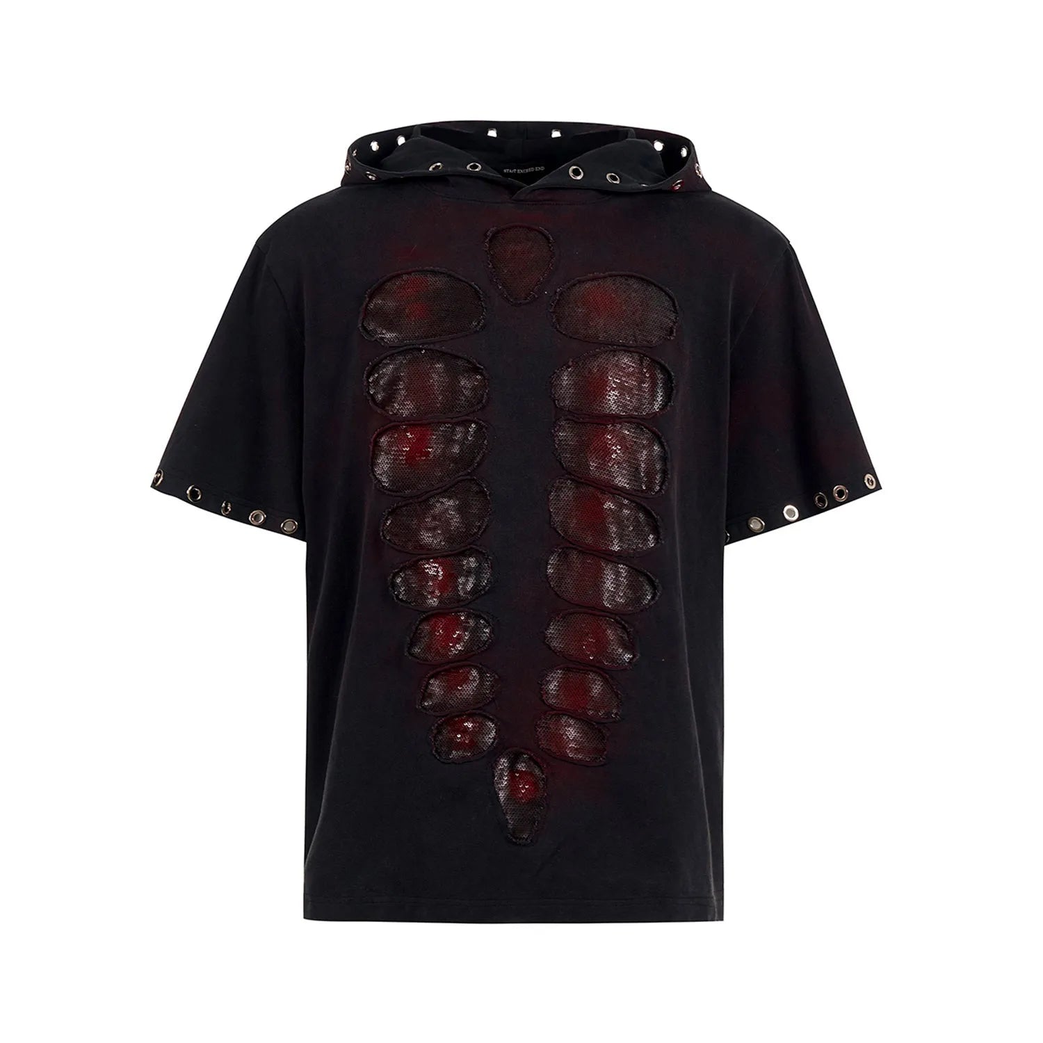 Black loose-fit men's hooded T-shirt covered in reflective sequins, shown in a casual setting.