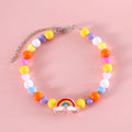 Colourful plastic bead pet necklace for dogs and cats in small flower, rainbow, or peach patterns.