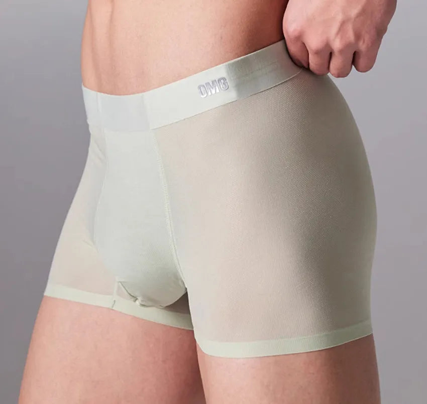 Men's lightweight seamless fitness shorts in black, shown flat, highlighting the antibacterial crotch panel and lack of seams.