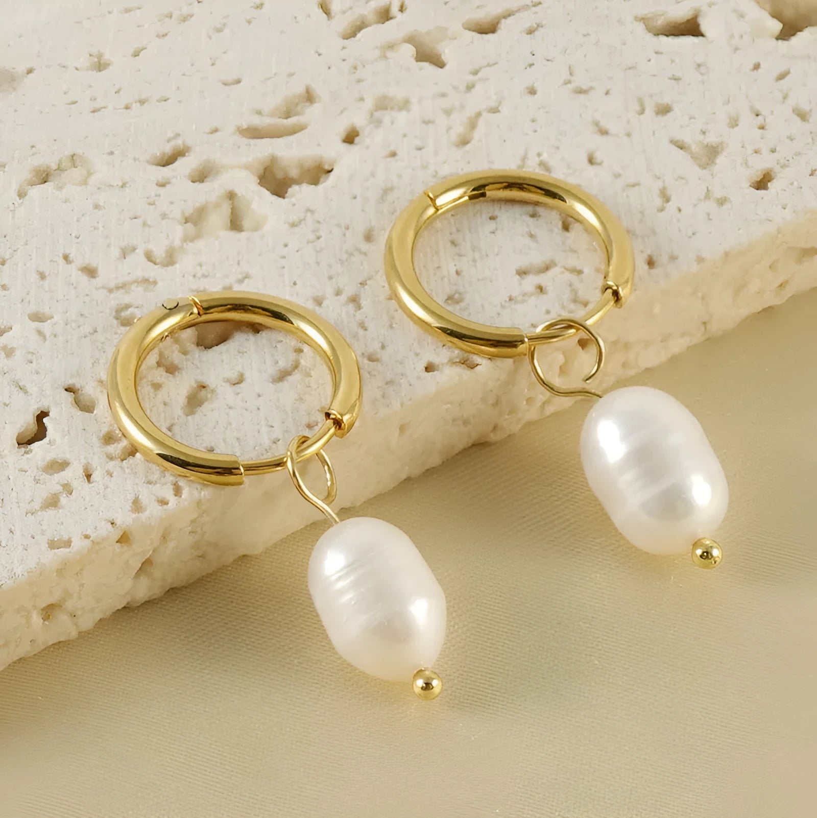 Geometric gold stainless steel earrings with pearl accents and titanium posts
