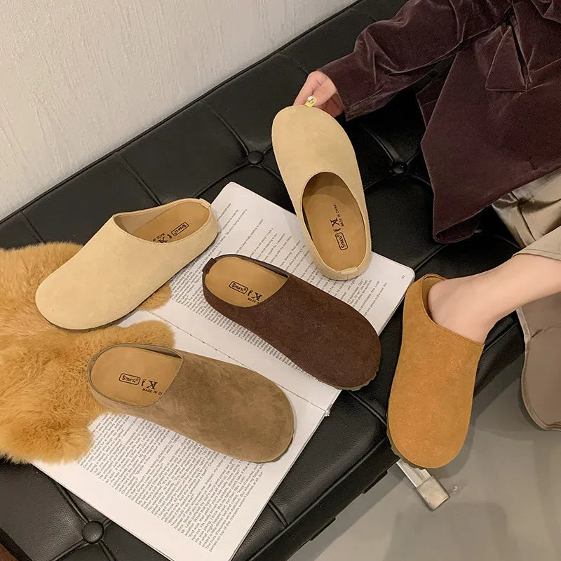 Pair of ugly soft flat Korean style slippers with square toe, shown in apricot colour.