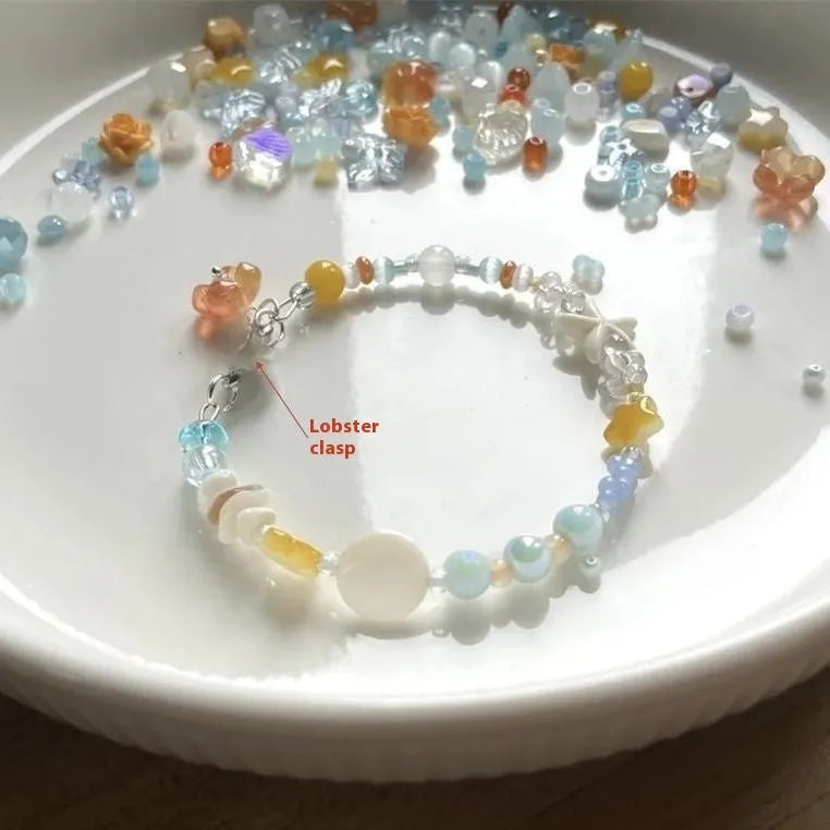 Orange alloy bracelet with diamond shape and round decorative elements for women's summer fashion