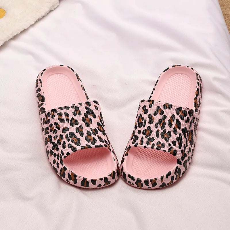 Women's leopard print EVA slippers with thick sole in black, pink, white zebra and khaki animal print colours