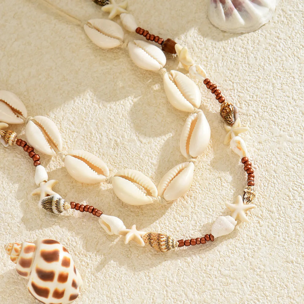 Bohemian shell necklace for women with geometric pendant on regular chain, colour X1900