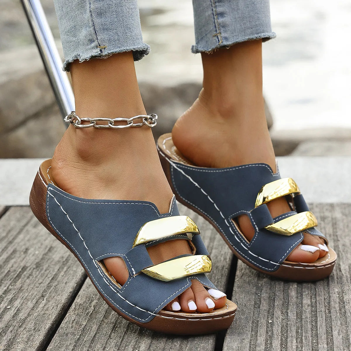 Breathable Roman style platform sandals in a solid colour with a metal detail on the artificial PU upper.