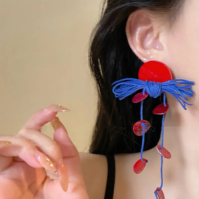 Geometric cloth earrings for women in 30 Silver Needle-blue resin flower colour, showing manual craftsmanship.