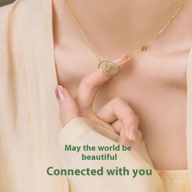 Handmade S925 sterling silver bamboo joint peace buckle necklace with pearl element on adjustable O-ring chain against neutral background