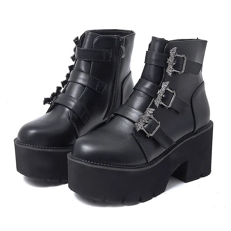 Black women's punk Martin boots with bat buckle, thick heel, and side zipper.