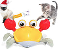 Blue interactive crawling crab dog toy with lights on, moving sideways on a floor.