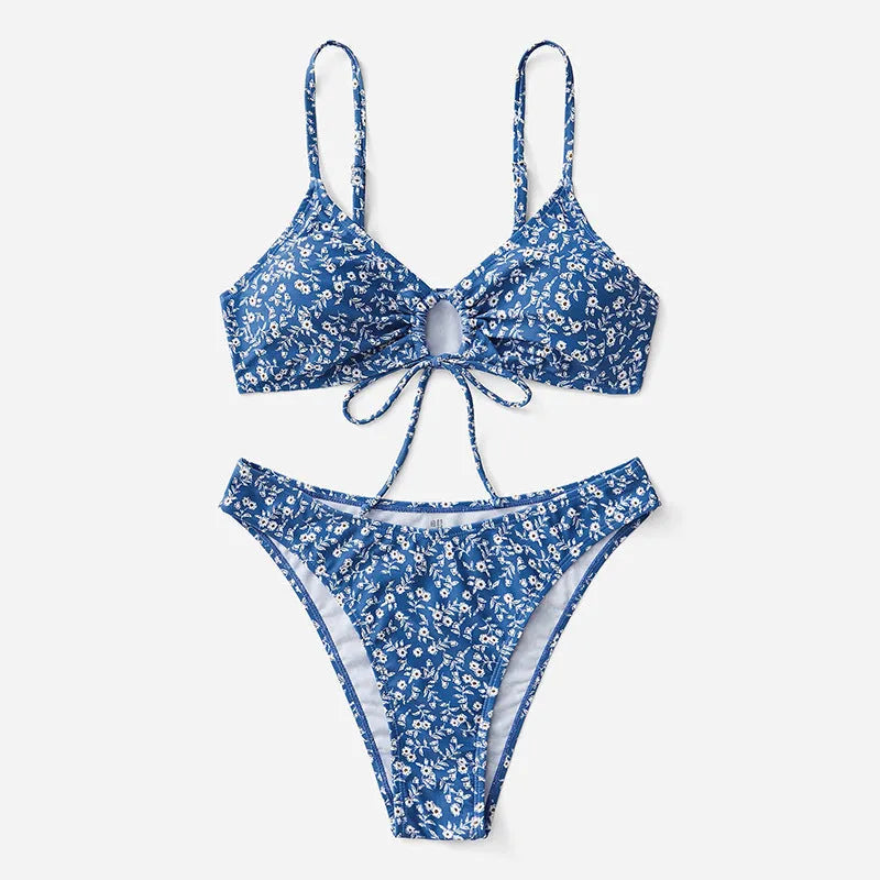 Blue ladies' two-piece swimsuit set with top and shorts on a mannequin.