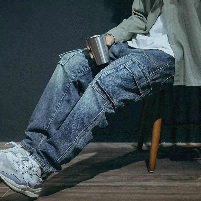 Men's blue loose straight leg jeans with retro styling and zip fly opening