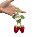 Handmade strawberry-shaped car pendant knitted from cotton and hemp fibres